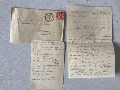 three old letters are sitting on top of each other on a table