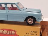 a toy car that is sitting on top of a box