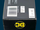 a box with a batman figure on it on a table