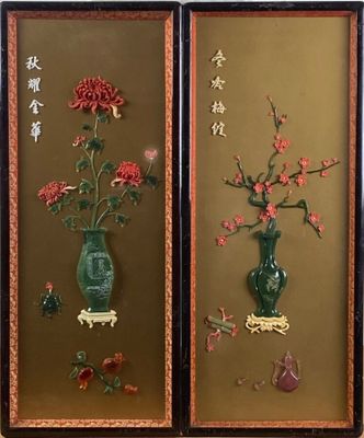 two framed pictures of flowers in a vase on the wall