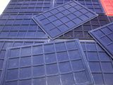 a pile of plastic trays sitting on a table