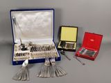 silverware in a blue box with a red case