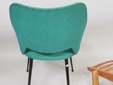 two chairs and a stool sitting next to each other