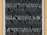 a black and white painting of leaves on a blue background
