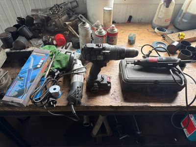 a table with a bunch of tools on it