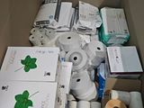 a box full of toilet paper and toilet paper rolls