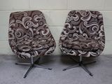 paire de fauteuils pivotants du milieu du siècle, avec coussins rembourrés
