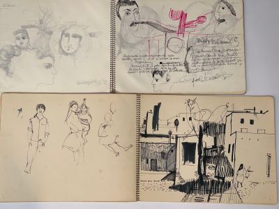 Plusieurs dessins représentant des personnes sont visibles dans un cahier posé sur une table