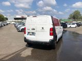a white van that is parked in a parking lot