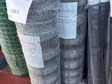 many rolls of gabio netting on the ground