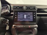 the dashboard of a car with a steering wheel and a steering control