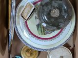 a box full of assorted plates and bowls in it