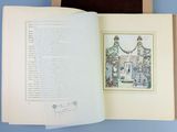 an open book with a picture of a woman in a garden on it