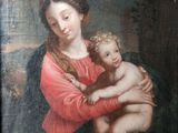 une image d'un tableau représentant une femme tenant un enfant dans ses bras
