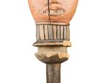 an image of a wooden head with a broken piece in the middle