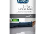 un gros plan d'une boîte de Starwax Brillat posée sur une table