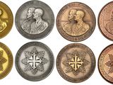 a close up of a bunch of coins on a white surface