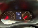 a close up of a car dashboard with a speedometer and gauges