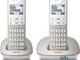 deux téléphones filaires posés côte à côte sur une surface blanche