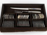 a box with a set of silverware in it