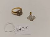 deux bagues en or et une bague sertie de diamants sur fond blanc