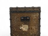an old suitcase sitting on a white surface with a white background