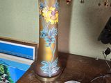 a lamp that is sitting on top of a wooden table