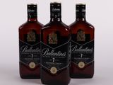 three bottles of ballantini ' s rum with a white background