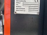 a close up of a deluxk machine with a label on it