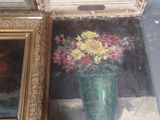 a painting of a vase of flowers next to a painting of a vase of flowers