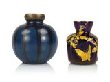 two vases sitting side by side on a white surface