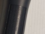 a close up of a bike handle on a white wall