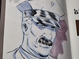 a drawing of a man with a hat and mustache