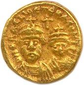 une pièce d'or portant l'image d'un homme et d'une femme