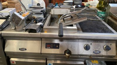 a lot of appliances that are sitting on the counter