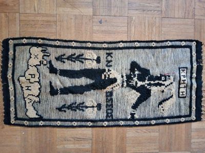 a rug with a picture of a man and a woman on it