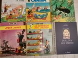 a lot of books that are on a table