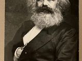 une vieille photo en noir et blanc d'un homme à la longue barbe