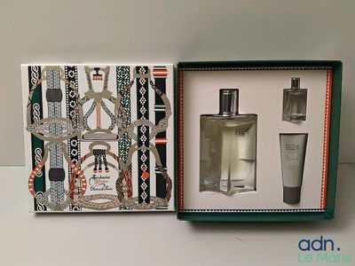 une image représentant une boîte contenant un flacon de parfum