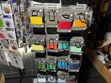 a display of cell phones and other electronics in a store