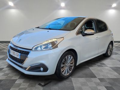 a white car parked in a garage with a checkered floor