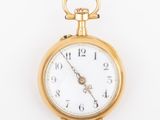 an image of a gold pocket watch on a white background