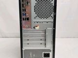 a close up of a computer tower with a keyboard and mouse