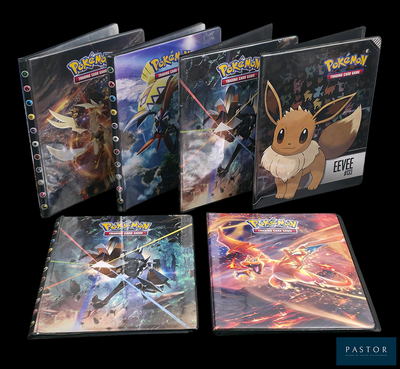 Plusieurs DVD des films Pokémon sont alignés sur une surface noire
