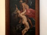 une image d'un tableau sur le mur d'une pièce