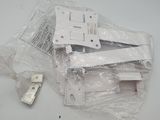 a pile of white electrical components on a table