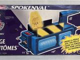 a box with a toy train inside of it on a table