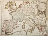 an old map of europe in a book on a table
