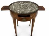 a small table with a marble top on it