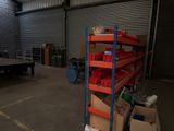 a large warehouse with a lot of boxes on the shelves